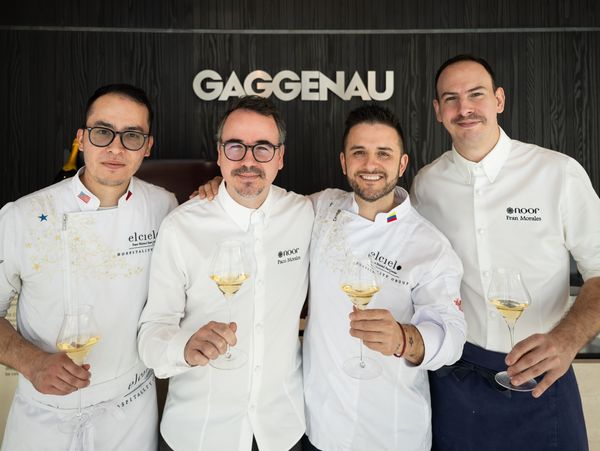 Chefs Paco Morales and Juan Manuel Barrientos pose with their assistant chefs outside the Gaggenau Miami showroom.