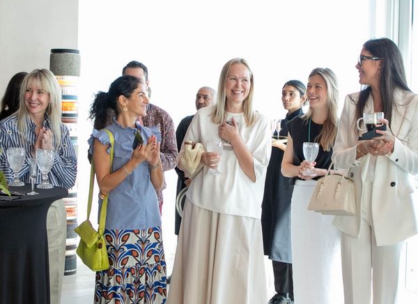 A group of Club 1683 guests smiling and laughing.